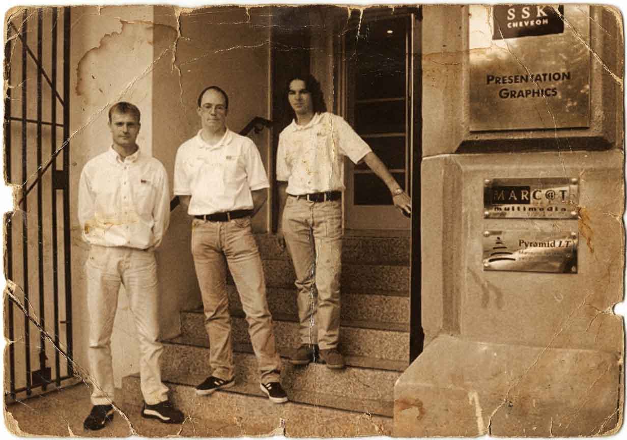 The Marcat team outside the office in Glasgow, late 1990s